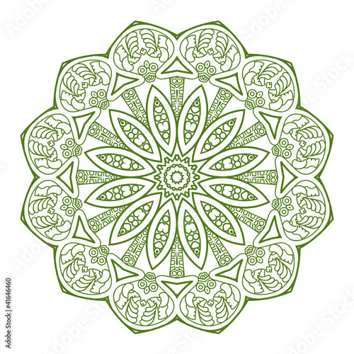 round ornament in green and white colors
