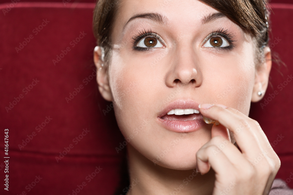 Naklejka premium A woman watching a movie