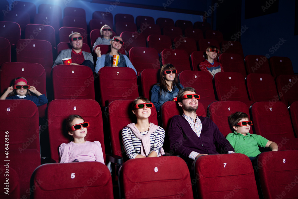 People in 3D movie theater People in 3D movie theater