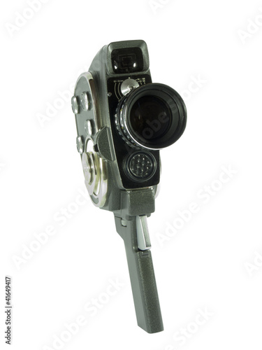 Old movie camera with lens photo