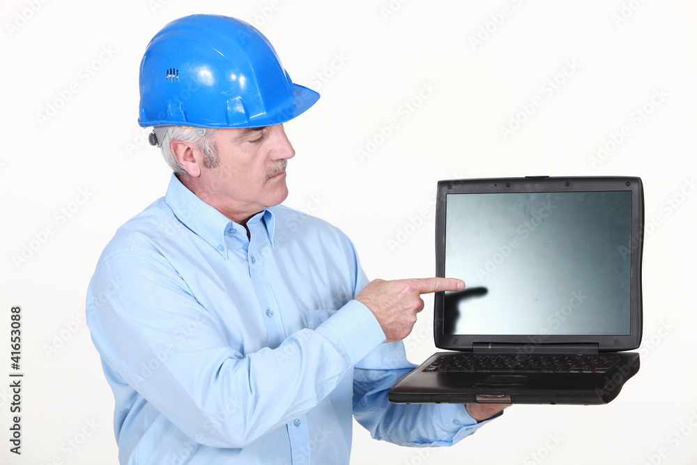 Architect pointing at laptop Architect pointing at laptop