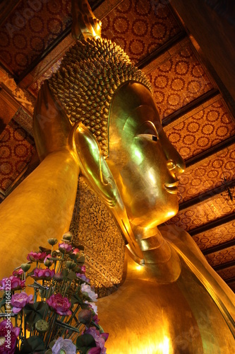 Giant reclining Buddha, Wat Pho, Bangkok, Thailand photo