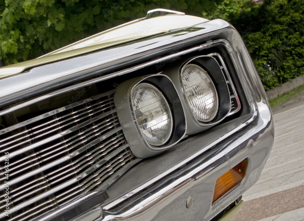 Headlight on old american muscle sports car
