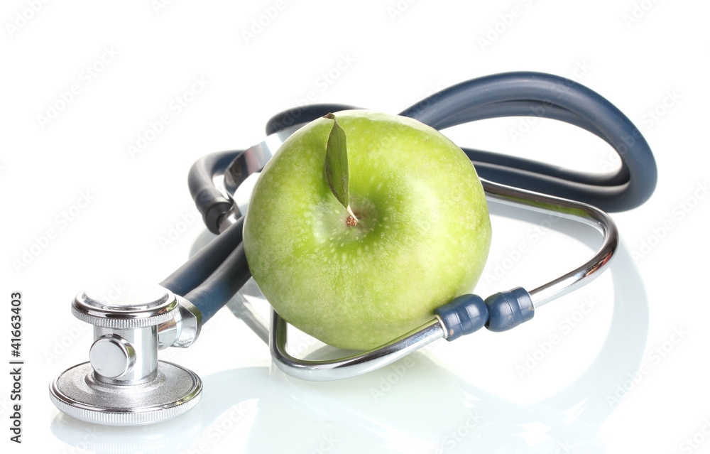 Medical stethoscope and green apple isolated on white Medical stethoscope and green apple isolated on white