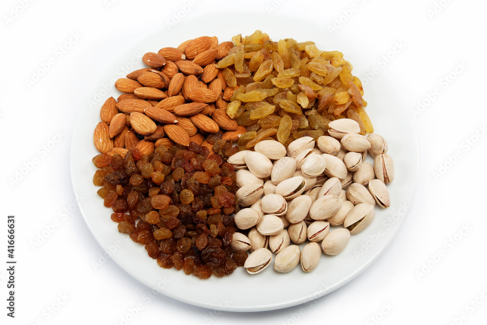 Nut-raisin mix. Almond and pistachio nuts and raisins. Nut-raisin mix. Almond and pistachio nuts and raisins.