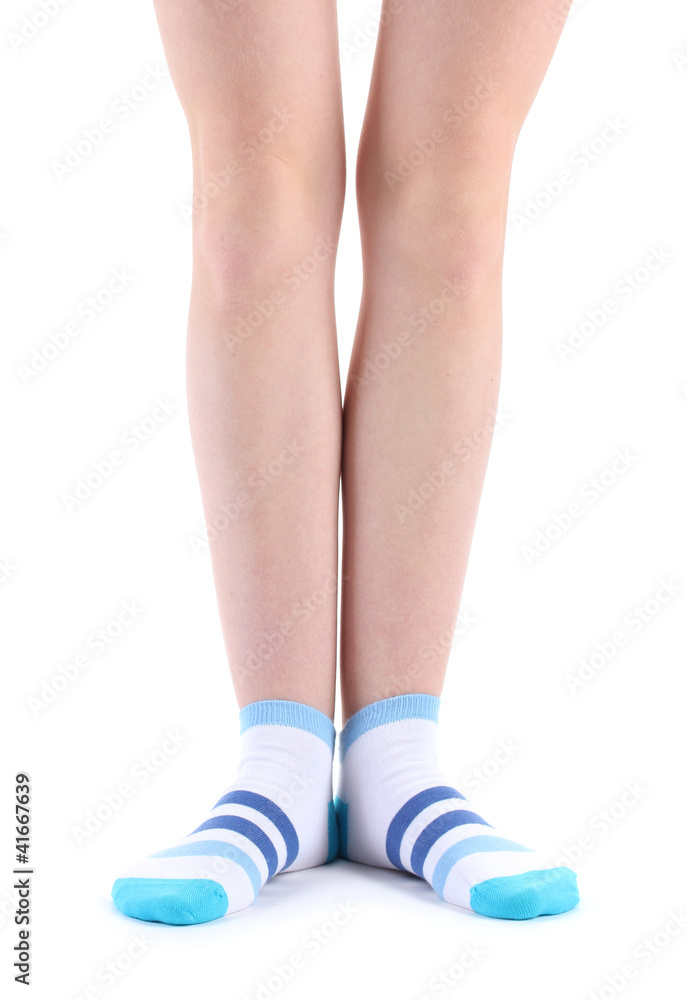 female legs in striped socks isolated on white female legs in striped socks isolated on white