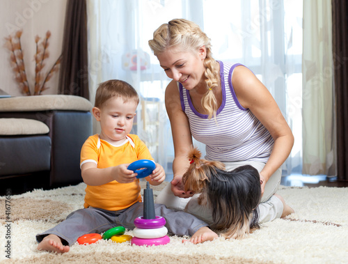mother, child boy and pet d...