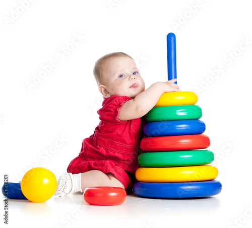 baby girl playing with big ...