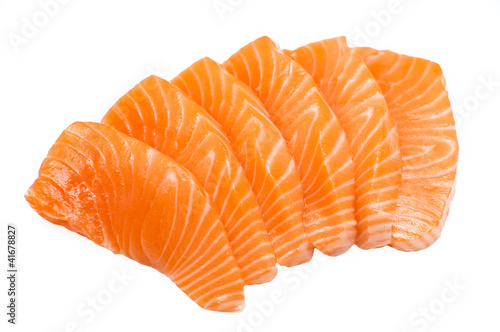 Fotografia Sliced raw fatty salmon isolated on white