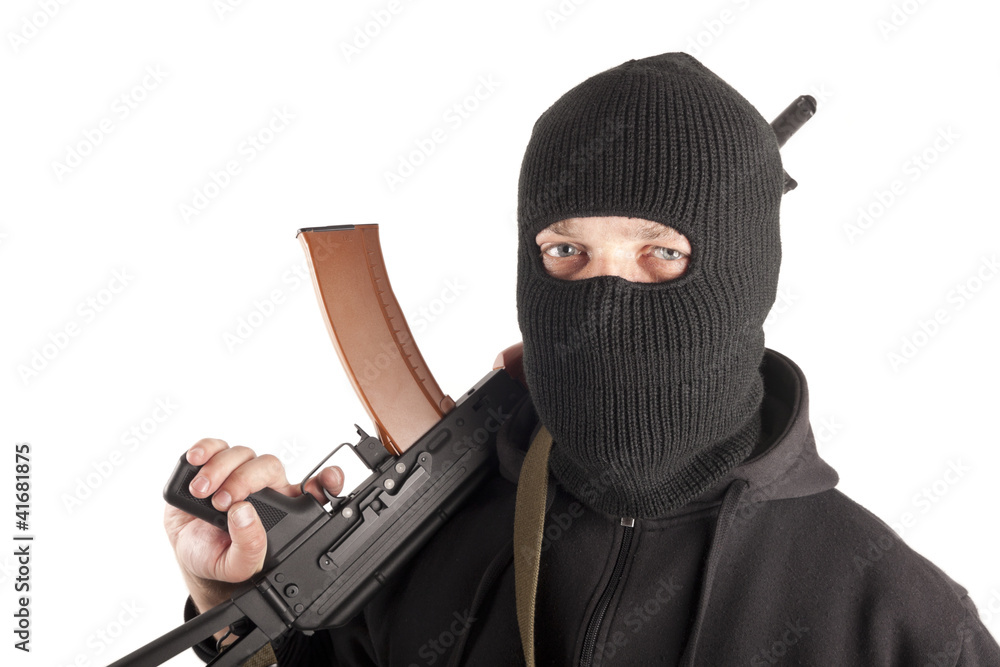 Man in mask with gun Man in mask with gun
