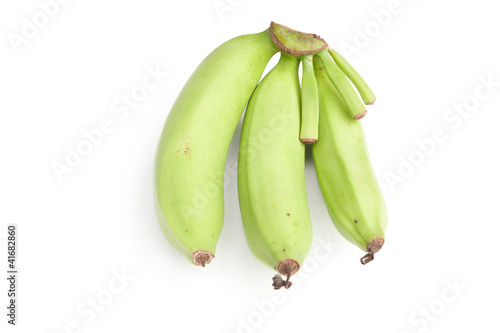 bunch of green bananas on white background