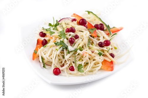 Plate with cabbage, cowberry, pepper, salinity. Russian traditio