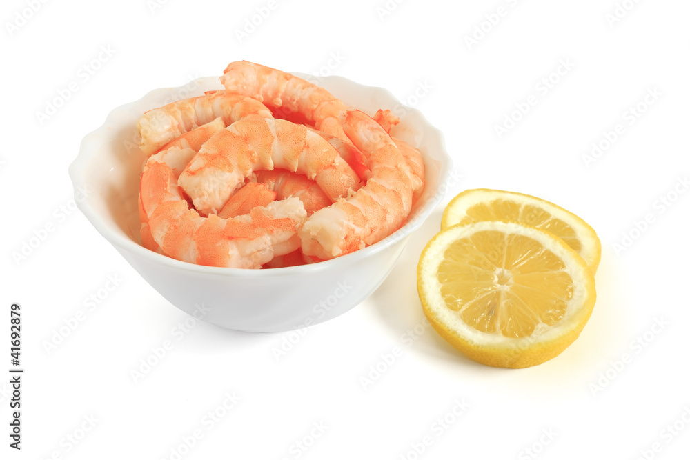 bowl with shrimps and sliced lemon bowl with shrimps and sliced lemon