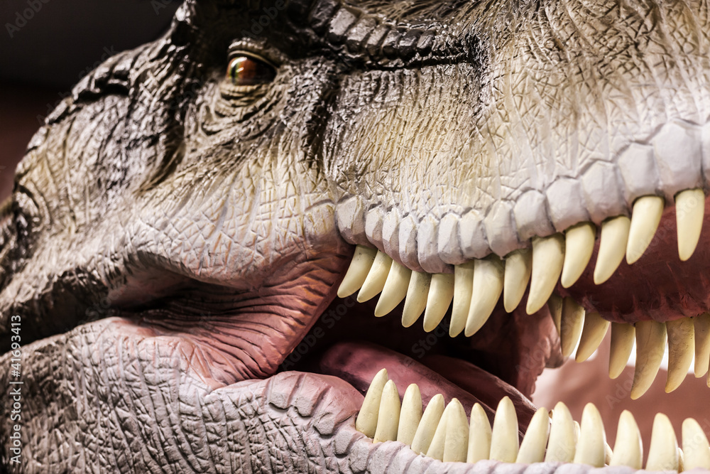 Obraz premium Tyrannosaurus przedstawiający jego zębate usta