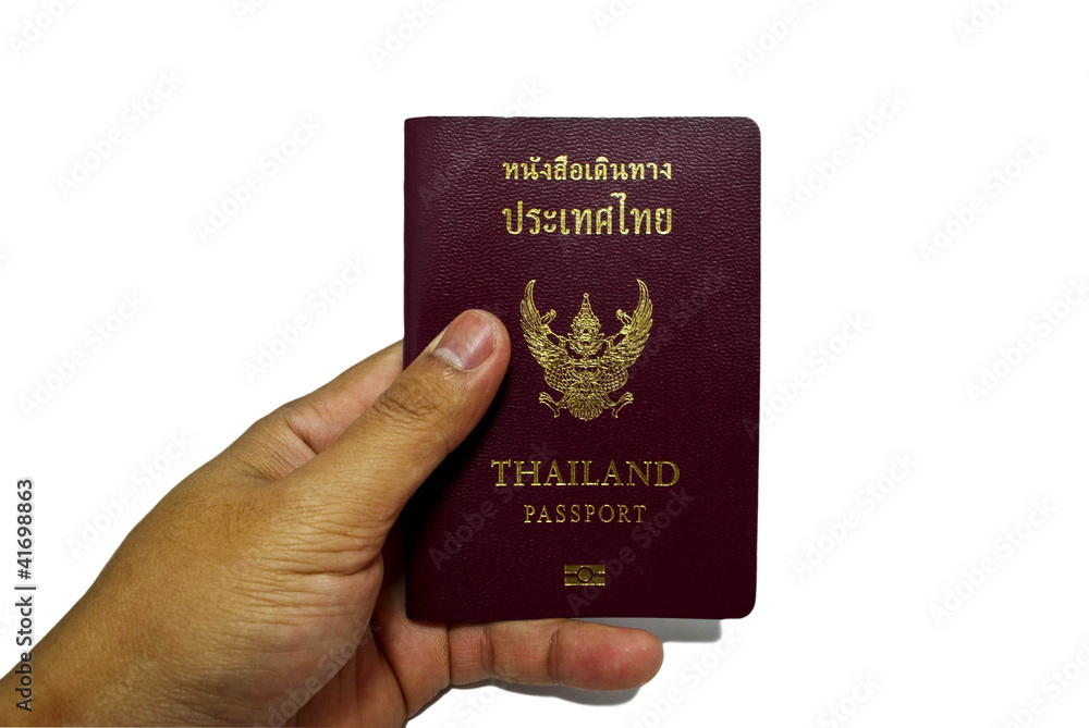 Stock Photo:.hand and passport isolated white. Stock Photo:.hand and passport isolated white.