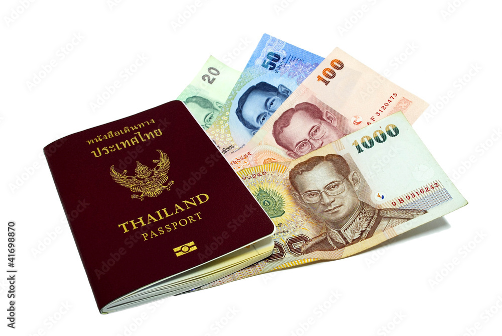 Thailand passport and Thai money on white background. Thailand passport and Thai money on white background.
