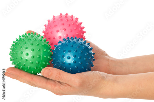 three colored massage balls