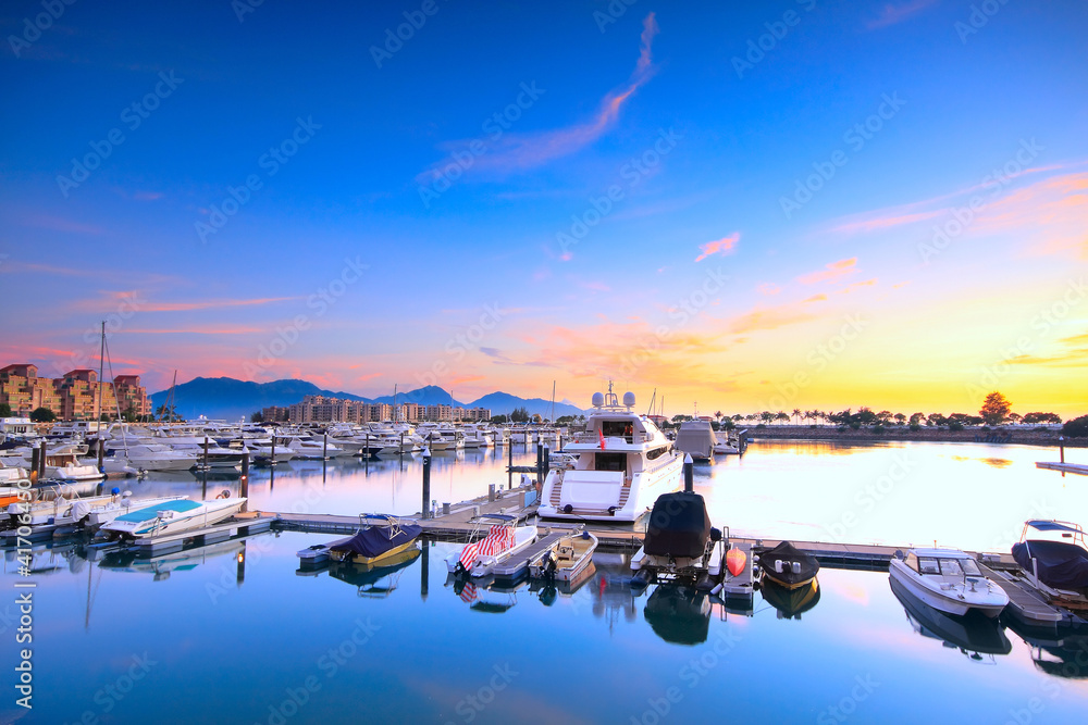 yachts in the golden coast sunset ,in hongkong