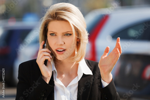 Young businesswoman calling on the phone