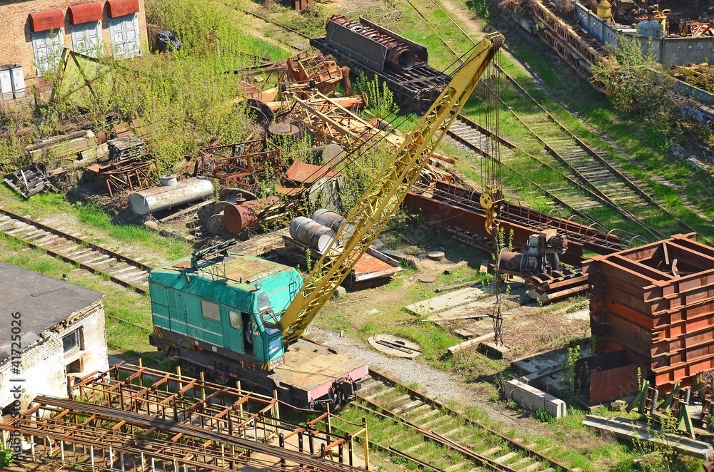 Train crane railcar. Hydraulic crane mounted on a railroad car Train crane railcar. Hydraulic crane mounted on a railroad car