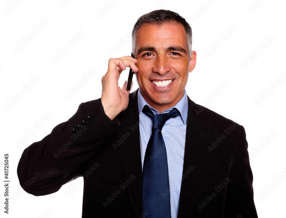 Attractive businessman speaking on mobile Attractive businessman speaking on mobile