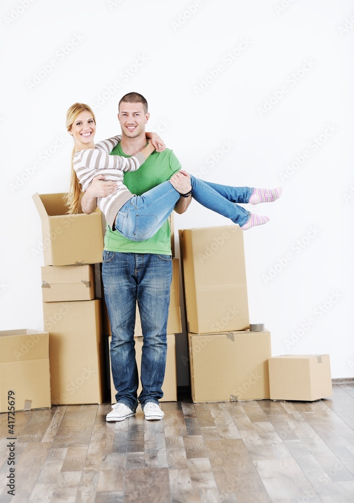 Young couple moving in new house Young couple moving in new house