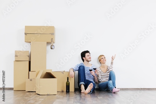 Young couple moving in new house