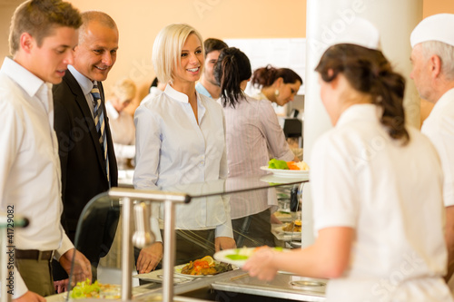 Business colleagues cook serve lunch canteen food photo
