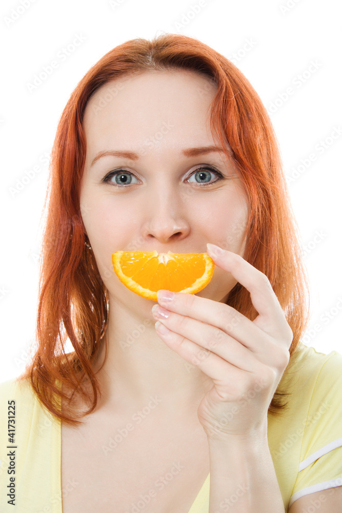 Young woman with oranges in her hands Young woman with oranges in her hands