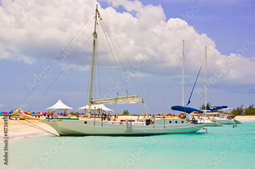 Boats at Turks and Caicos deserted beach