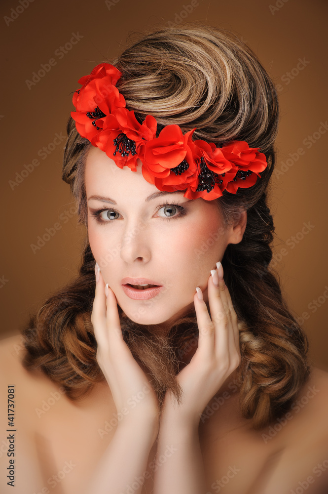 Naklejka premium Beautiful woman in bright red poppy wreath, closeup