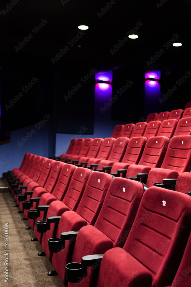 Red seats of cinema hall Red seats of cinema hall
