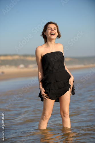 woman standing at the beach