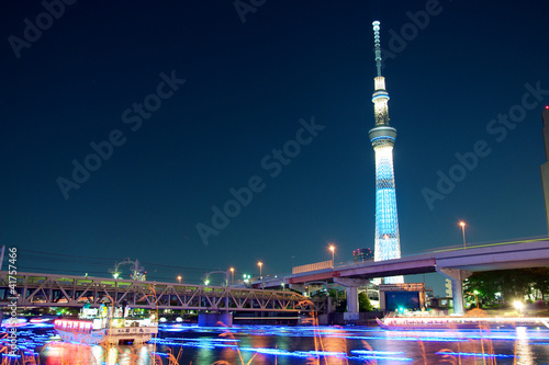 Tokyo skytree blue illumination beside Sumida river