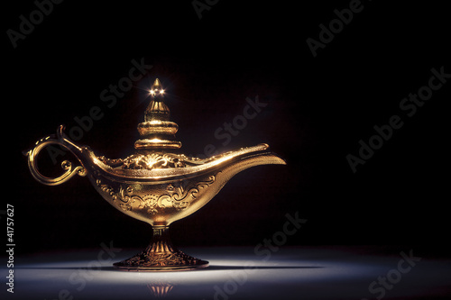 Magic Aladdin's Genie lamp on black