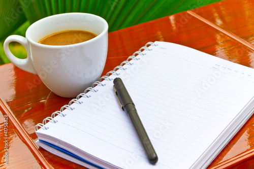 white note with coffee