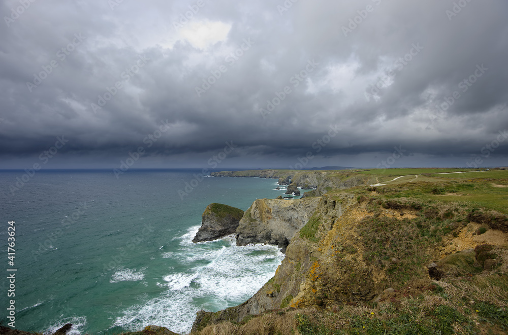 Storm clouds brewing over Bedruthan Steps near Newquay.