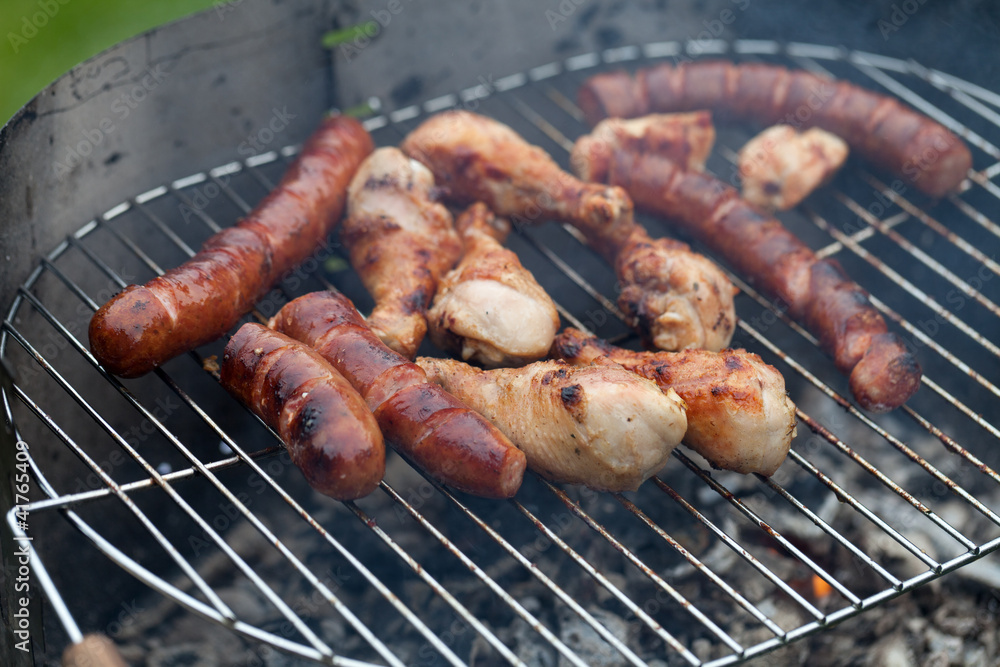 barbecue with delicious grilled meat on grill