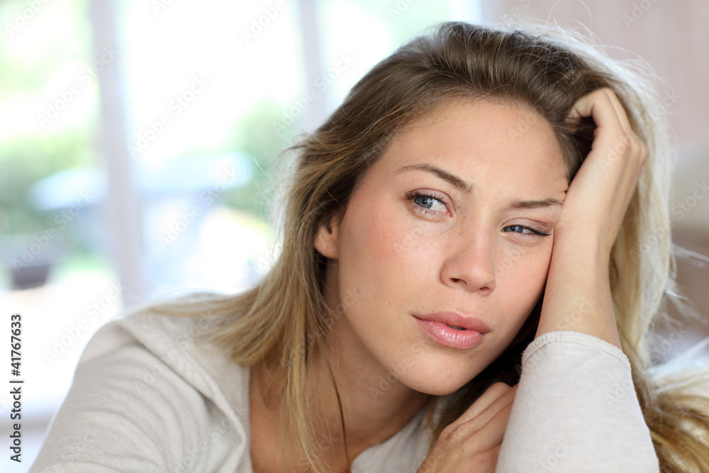 Portrait of blond woman with boring look Portrait of blond woman with boring look