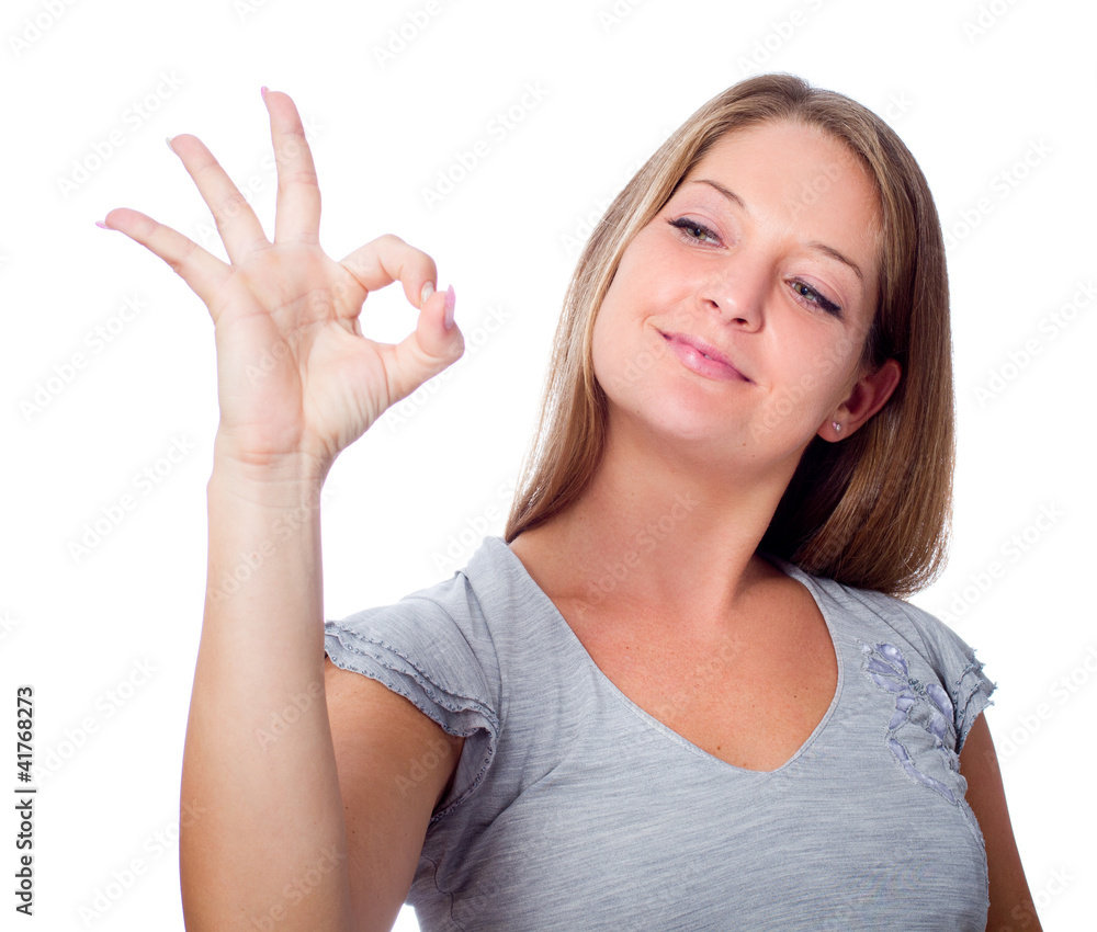 the girl shows gesture of approval to something the girl shows gesture of approval to something