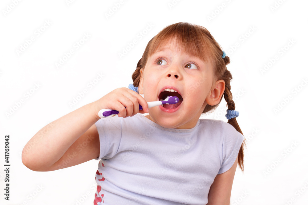 Pretty little girl brushes her teeth Pretty little girl brushes her teeth