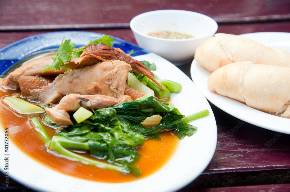 Steam pork leg with gravy and vegetable with White Wheat Bun Steam pork leg with gravy and vegetable with White Wheat Bun