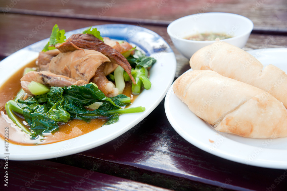 Steam pork leg with gravy and vegetable with White Wheat Bun Steam pork leg with gravy and vegetable with White Wheat Bun