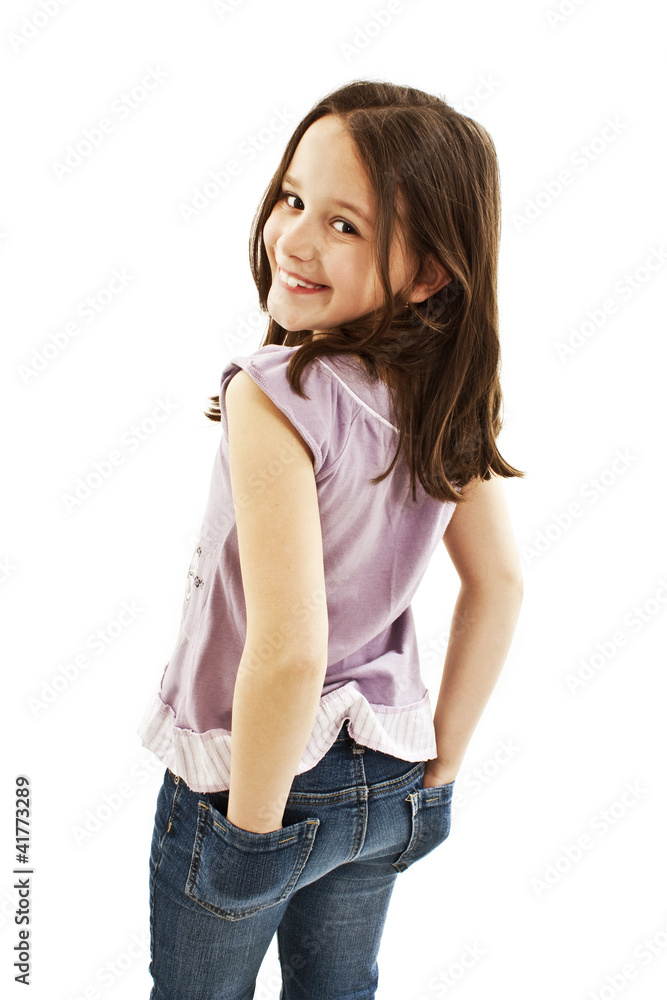 A little girl with hands in jeans pockets over white Stock Photo | Adobe  Stock