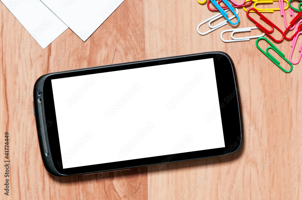 smartphone on a desk with clipping paths for the screen smartphone on a desk with clipping paths for the screen