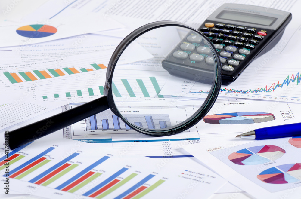 Business diagramme with magnifying glass Business diagramme with magnifying glass