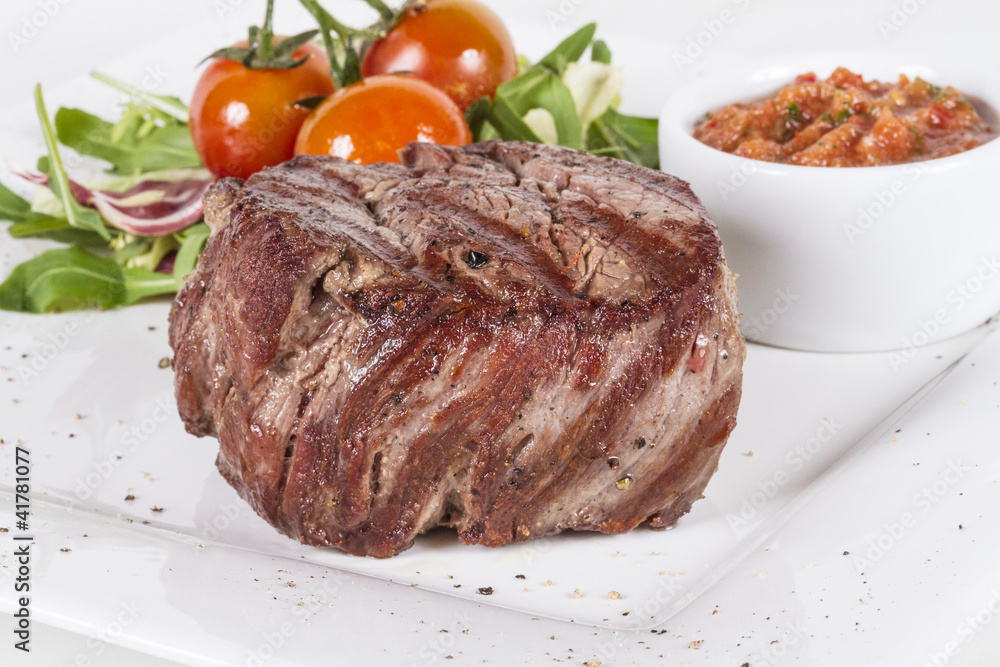 Grilled Beef Steak Isolated On a White Background Grilled Beef Steak Isolated On a White Background