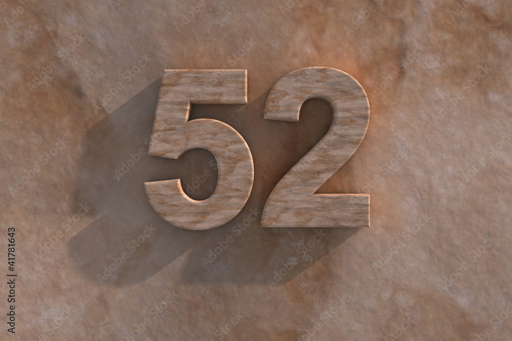 The number 52 carved from marble on marble base The number 52 carved from marble on marble base