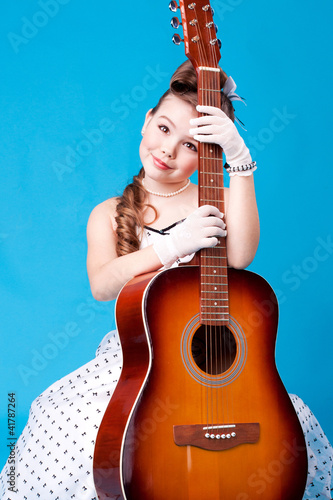 a girl with guitar photo