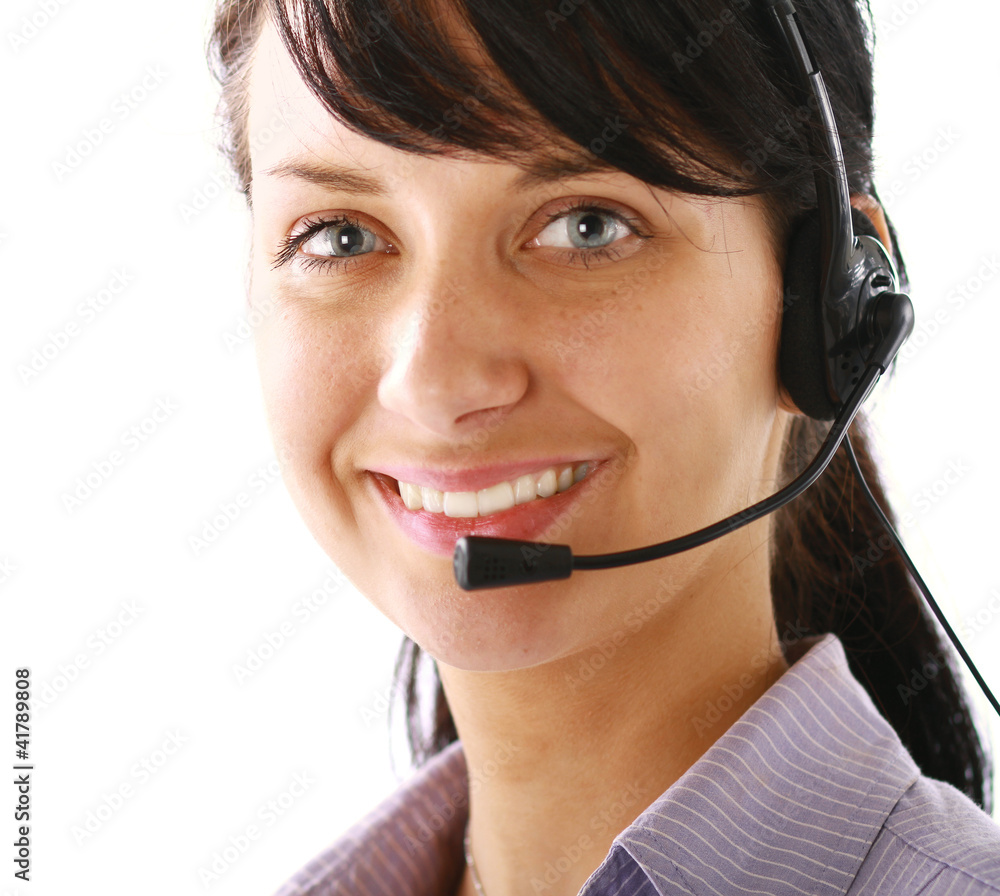 Smiling businesswoman using headset isolated Smiling businesswoman using headset isolated
